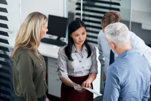 Group of professionals in a discussion.