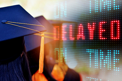 Students wearing graduation caps and gowns fades into a train schedule board with the word "delayed" in red shown on it.