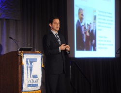 Male speaker addressing the audience in a breakout session.